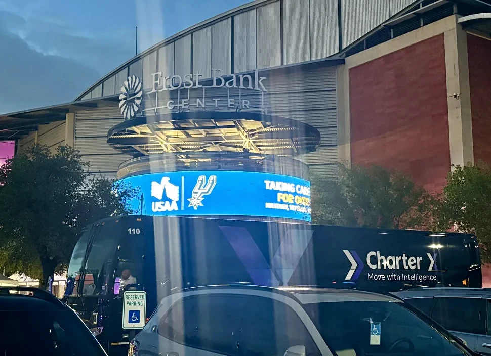 CharterX-branded coach outside a venue during ETI transportation operations